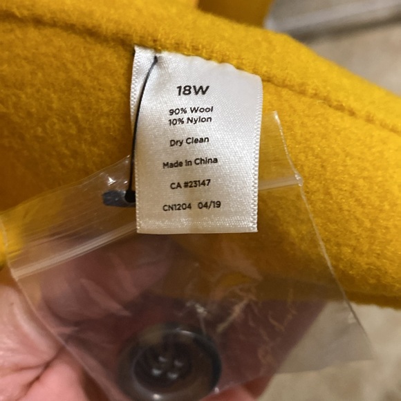 A woman’s mustard, yellow wool coat. - Picture 6 of 6